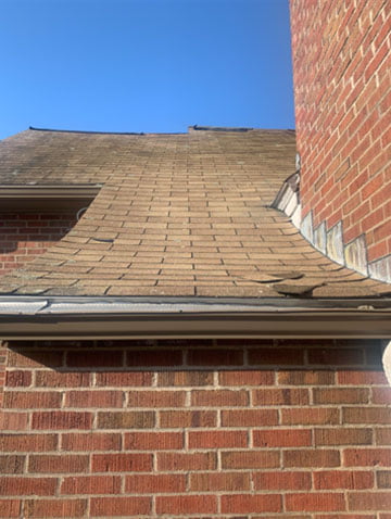 Before — old roof prior to replacement
