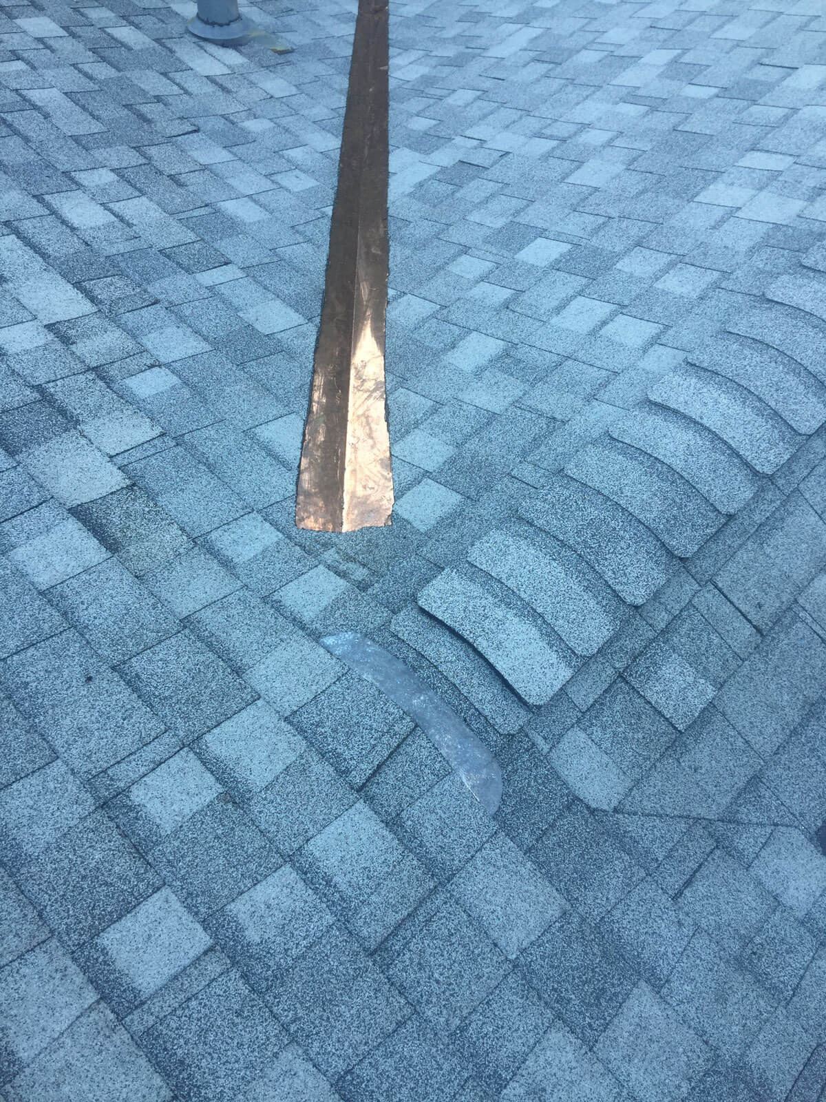 Close-up of new shingle craftsmanship