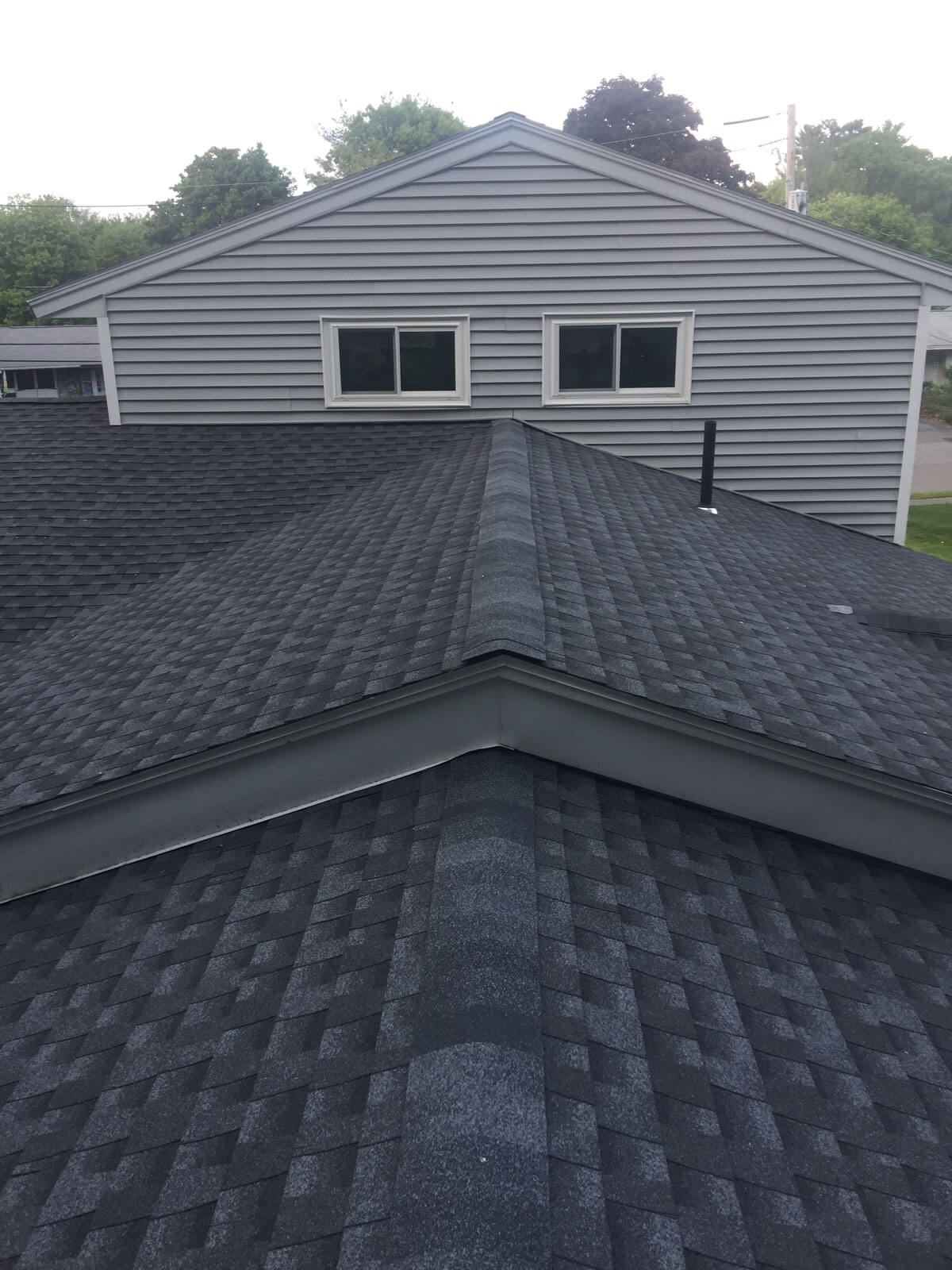 Dark architectural shingles with dormer detail