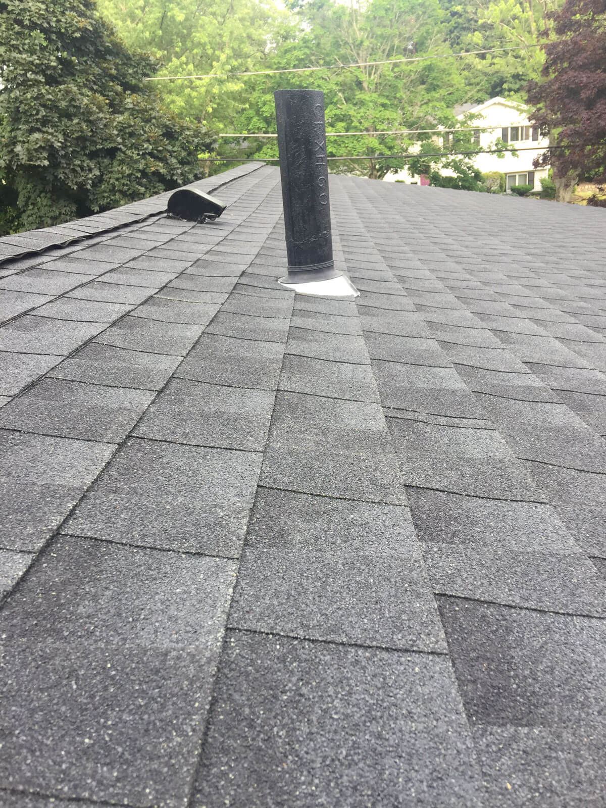 New shingle roof with vent stack