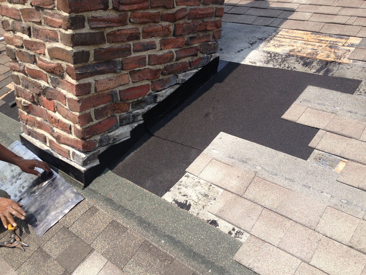Chimney flashing repair in progress